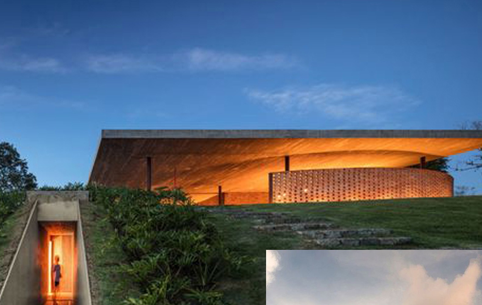 Presidential villa pavilion glowing at dusk on the crest of the estate